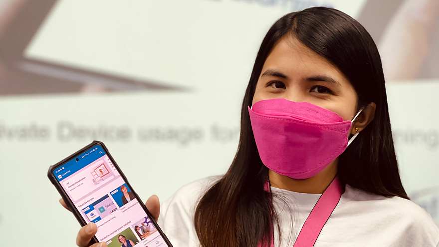 Employee showing phone