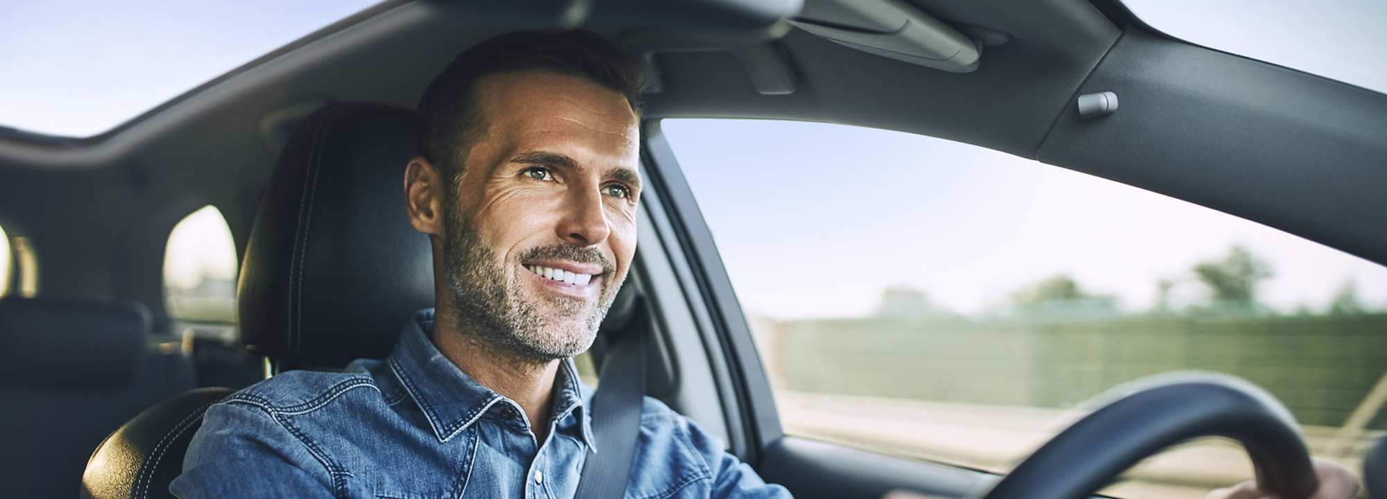 Man driving a car