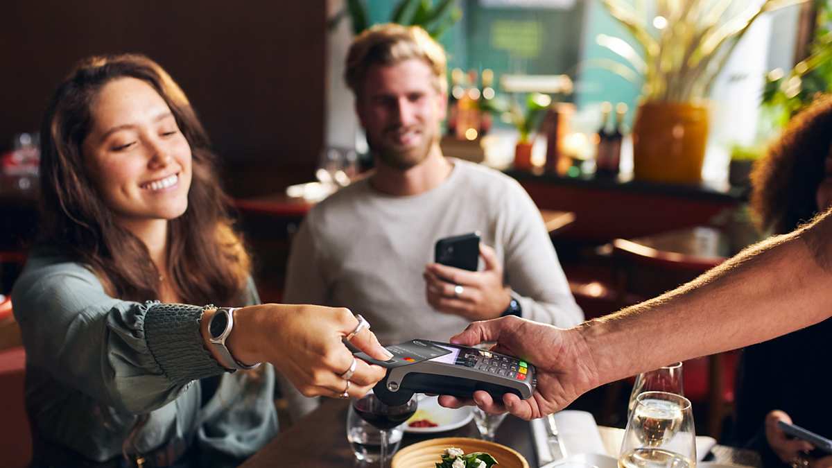 Woman pays with fingerprint card