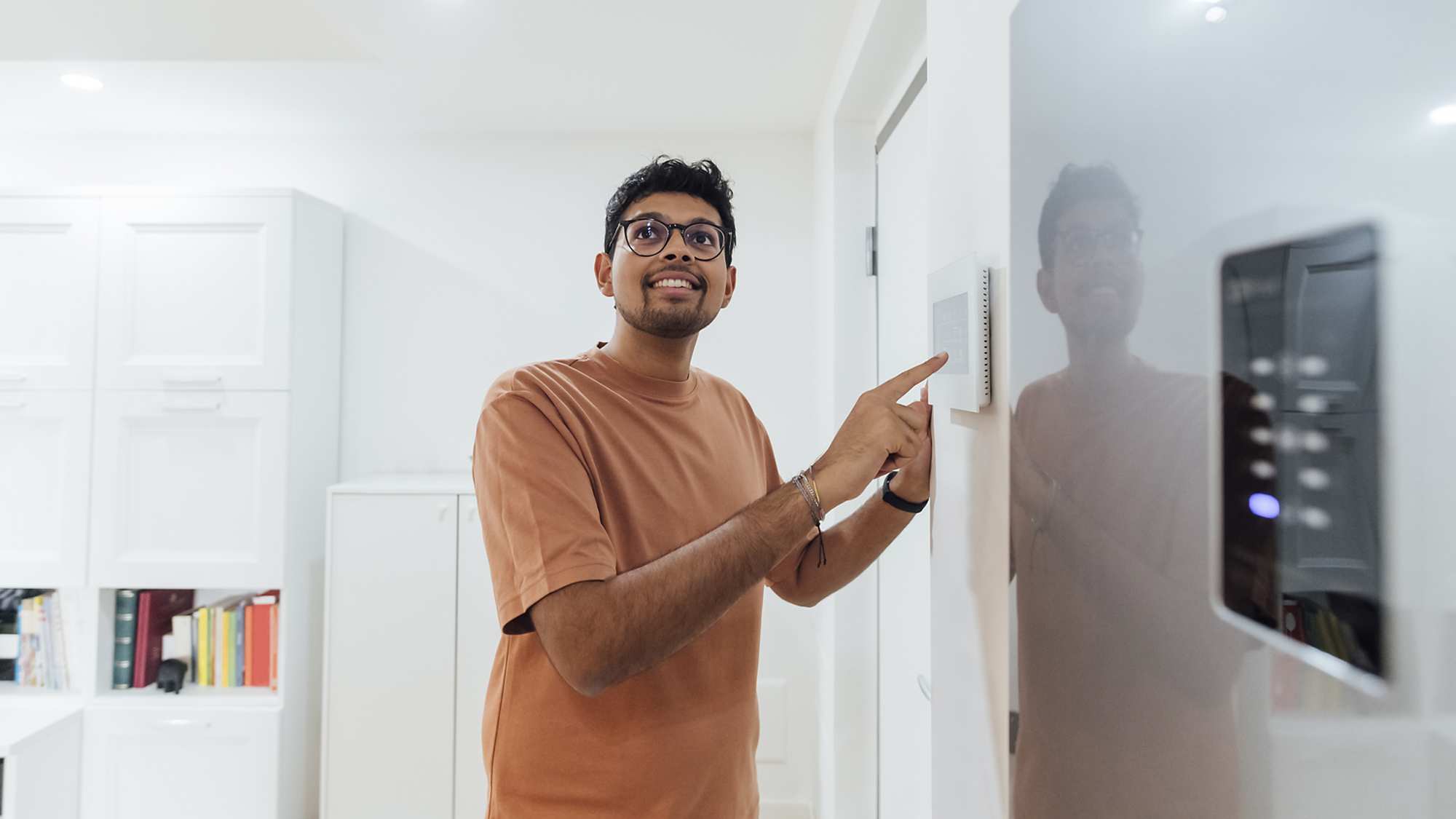 Man using samrt home panel