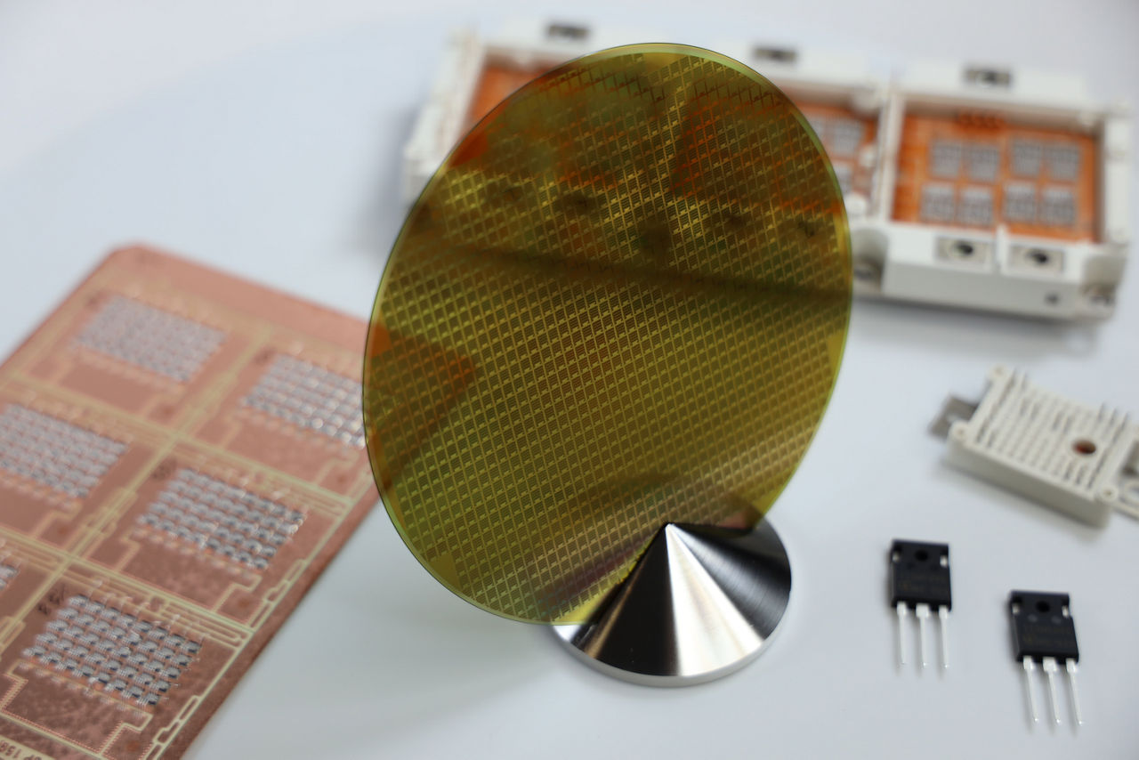 Close-up of a semiconductor wafer used to produce advanced SiC MOSFETs and power devices for industrial, automotive, and energy applications.