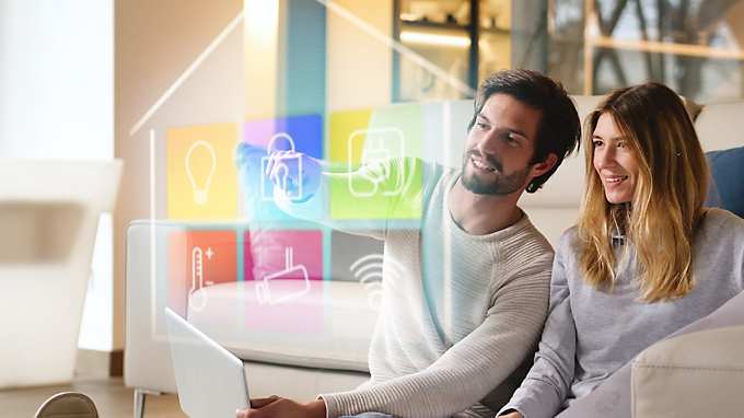 Couple in their smart home