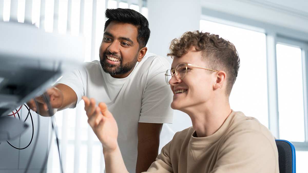 two men working in the office