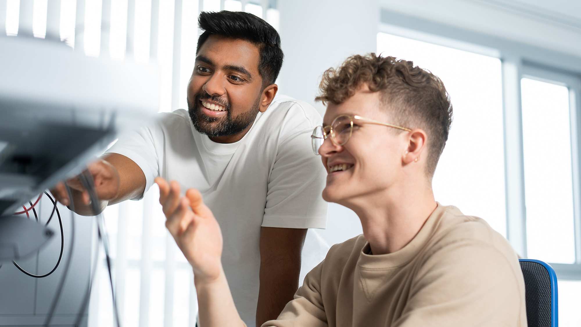 two men working in the office