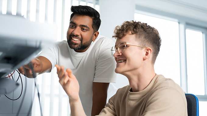 two men working in the office