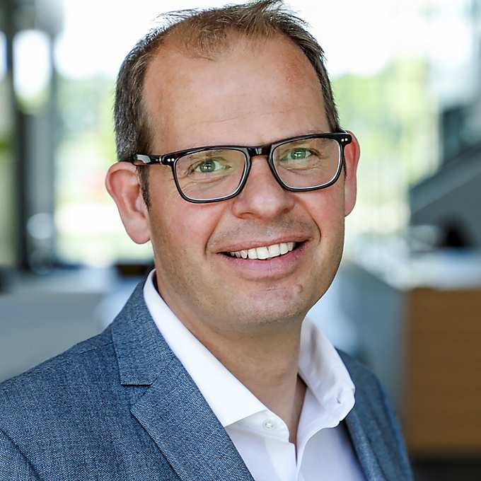 Adam White, Division President Power & Sensor Systems at Infineon