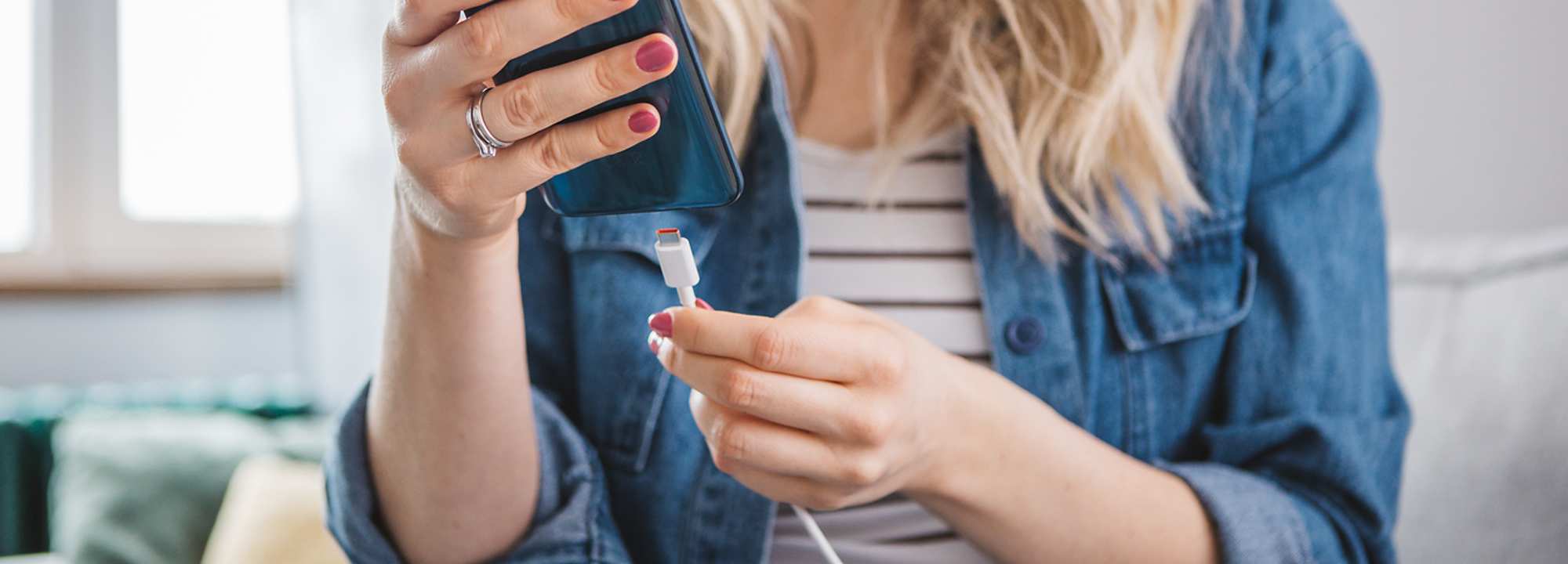 woman with smartphone charger